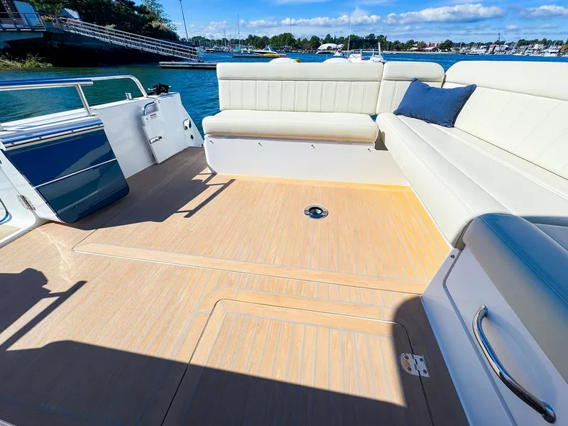 Slide: The Image of Spacious deck of 2024 MJM 4 boat with comfortable seating and scenic waterfront view. - 8