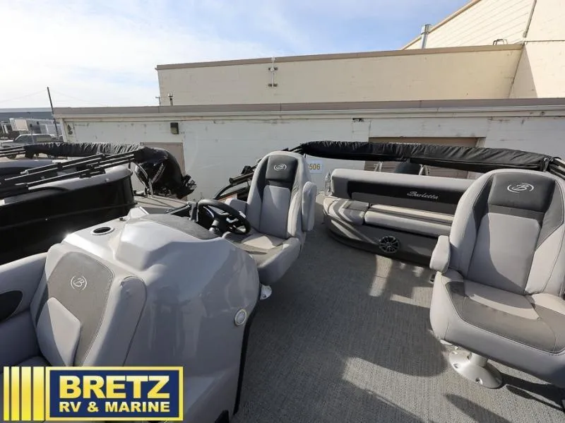 Slide: The Image of 2025 Aria Ultra-Lounge A22UC boat interior with gray seating at Bretz RV & Marine. - 8
