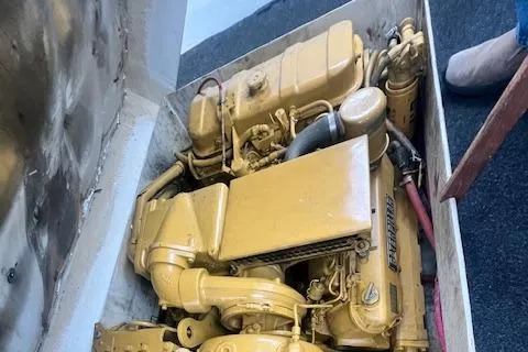 Slide: The Image of 1972 REPCO Buxton Downeast Hardtop Cruiser engine in compartment, yellow machinery. - 23