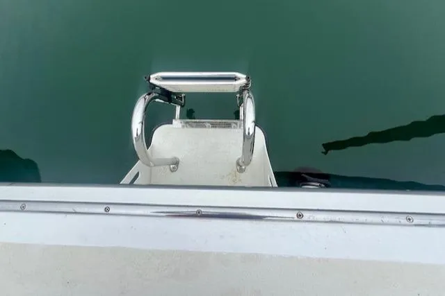 Slide: The Image of 1972 REPCO Buxton Downeast Hardtop Cruiser swim platform over calm water. - 26