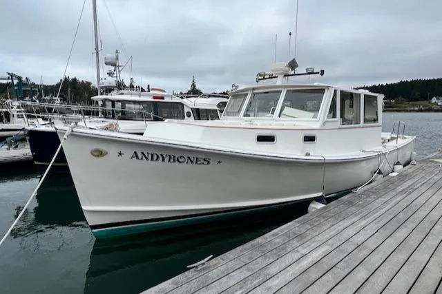 Slide: The Image of 1972 REPCO Buxton Downeast Hardtop Cruiser docked at marina. - 28