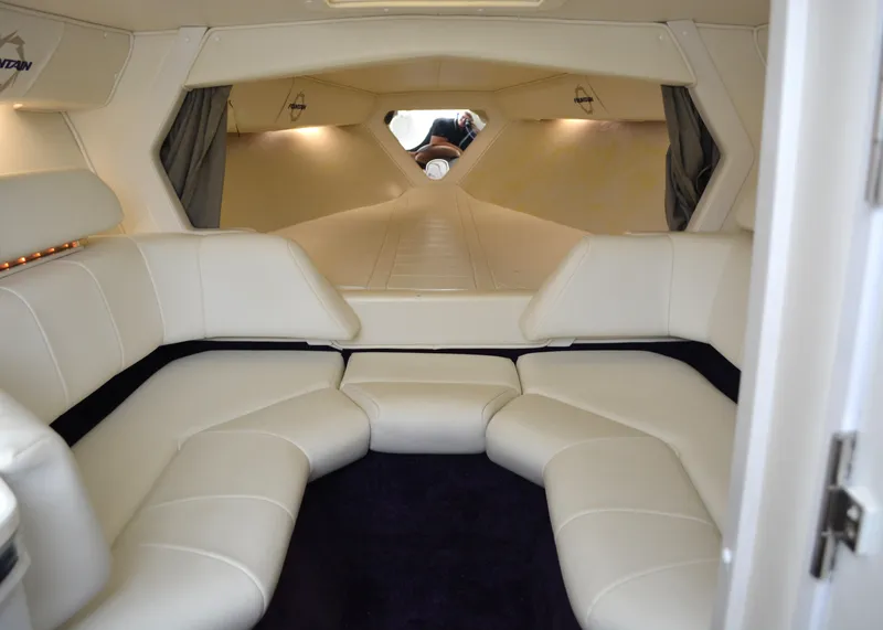 Slide: The Image of Luxurious interior of 2007 Fountain 35 Executioner boat with white leather seating. - 17