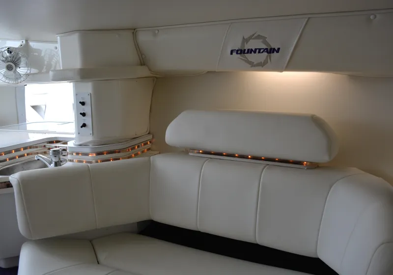 Slide: The Image of Luxurious interior of 2007 Fountain 35 Executioner boat with white leather seating. - 22