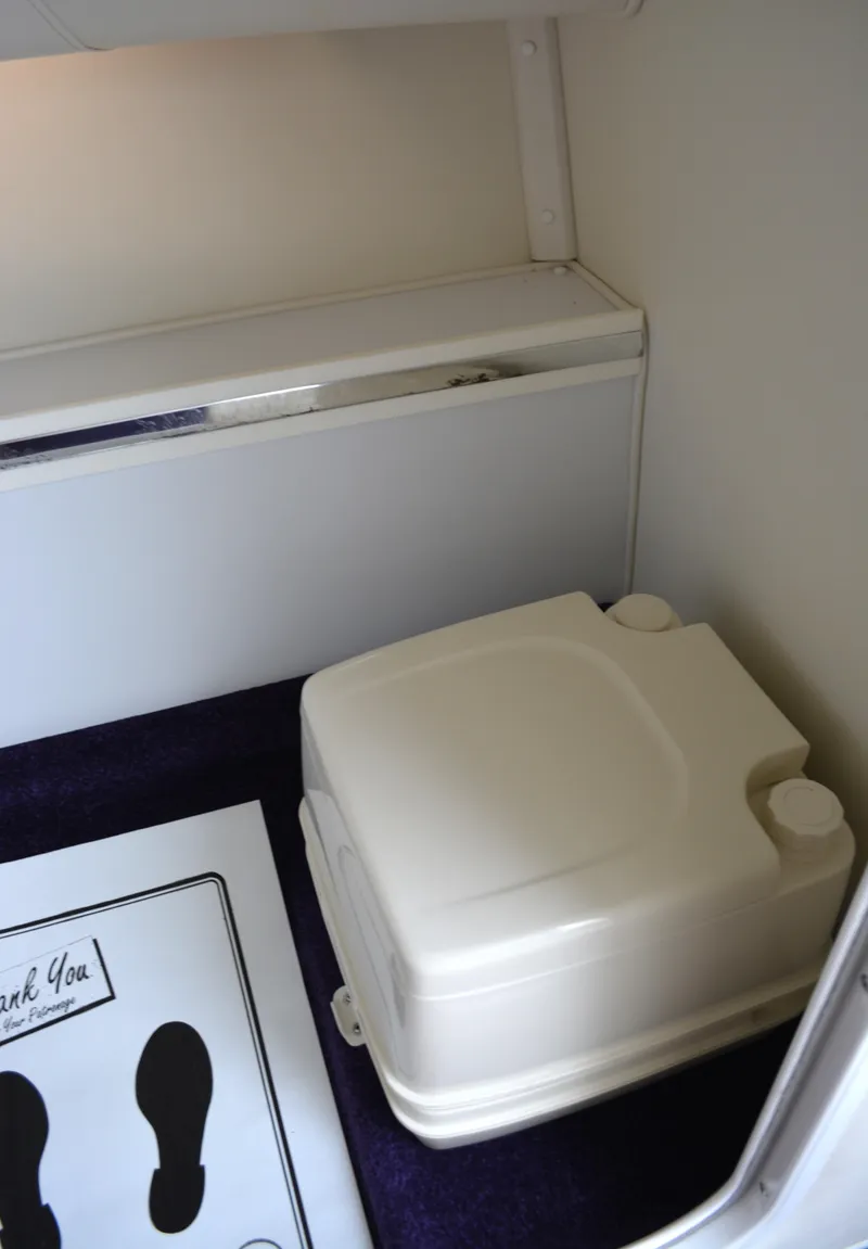 Slide: The Image of Portable toilet inside 2007 Fountain 35 Executioner boat cabin. - 25