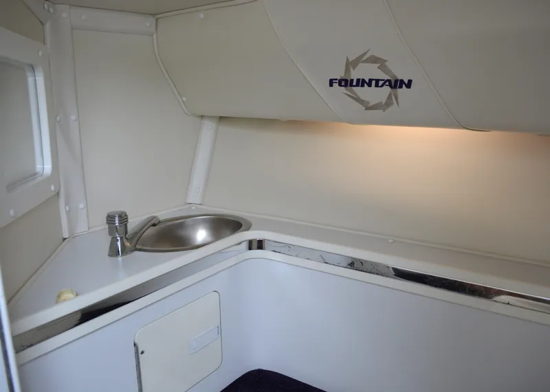 Slide: The Image of Interior cabin of 2007 Fountain 35 Executioner boat with sink and lighting. - 26