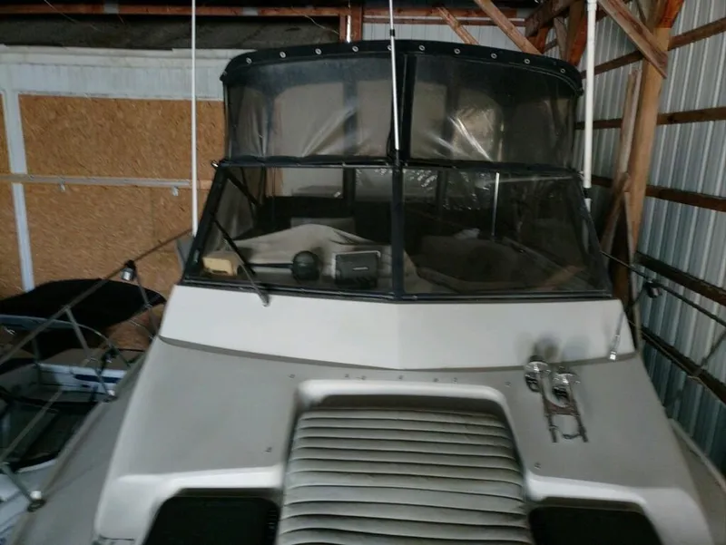 Slide: The Image of 1988 Carver Mariner 32 boat in storage, front view. - 3