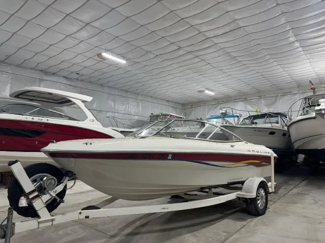 Slide: The Image of 2001 Bayliner Capri 195 LX boat in indoor storage facility. - 4