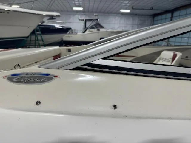 Slide: The Image of 2001 Bayliner Capri 195 LX boat in indoor storage facility. - 6