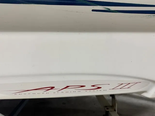 Slide: The Image of 2001 Bayliner Capri 195 LX boat with APS III logo detail. - 7