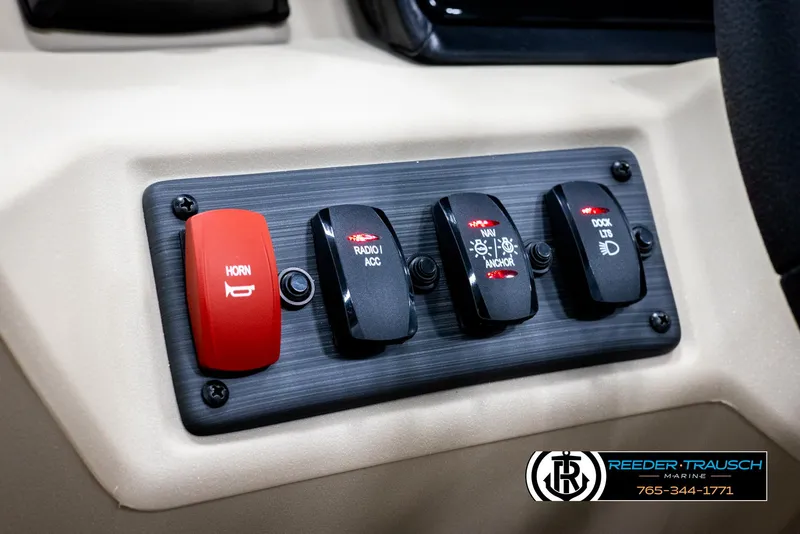Slide: The Image of Control panel of 2025 Bennington 188 SSSE boat with switches and horn button. - 29