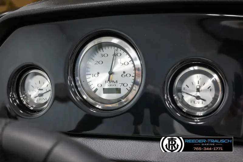 Slide: The Image of Dashboard gauges of 2025 Bennington 188 SSSE boat, featuring RPM and fuel indicators. - 31