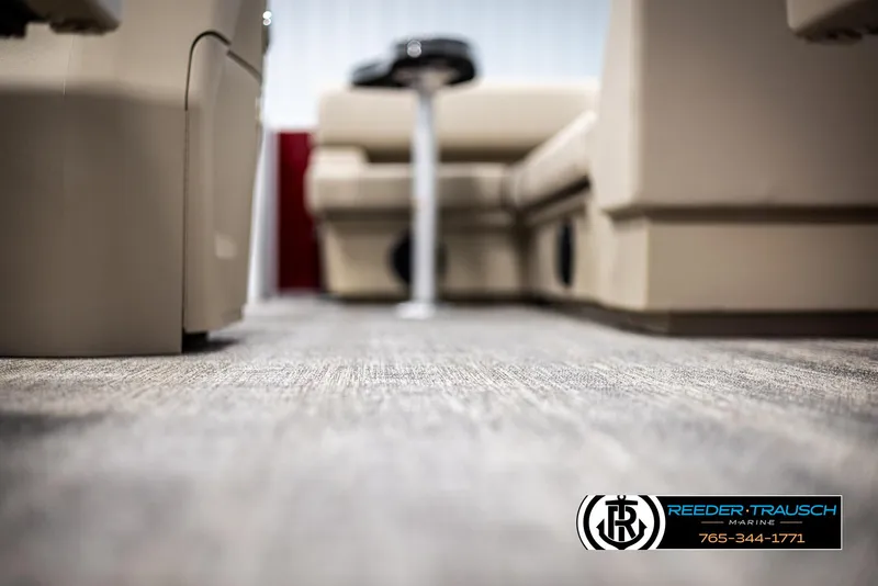 Slide: The Image of Interior view of 2025 Bennington 188 SSSE boat with plush seating and carpeted floor. - 43