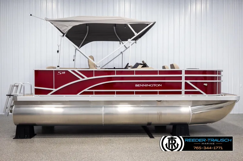 Slide: The Image of 2025 Bennington 188 SSSE pontoon boat with red exterior and canopy. - 5