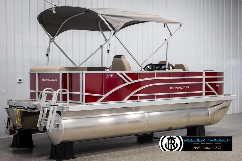 Slide: The Image of 2025 Bennington 188 SSSE pontoon boat with canopy in showroom. - 6
