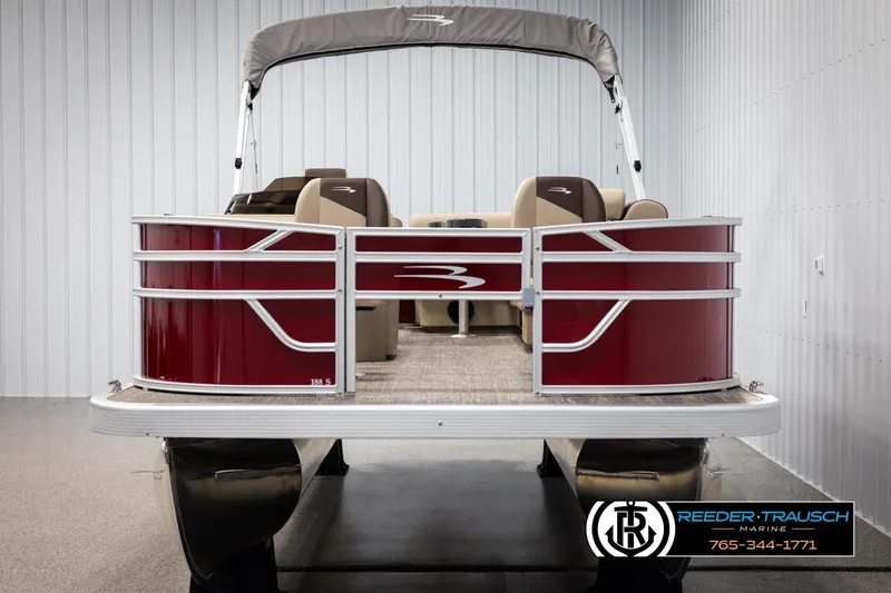 Slide: The Image of 2025 Bennington 188 SSSE pontoon boat with red exterior and beige seating. - 8