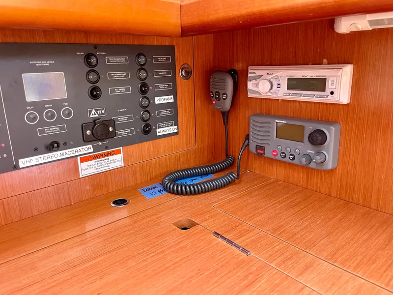 Slide: The Image of Control panel of a 2010 Beneteau Oceanis 37 sailboat with communication equipment. - 17