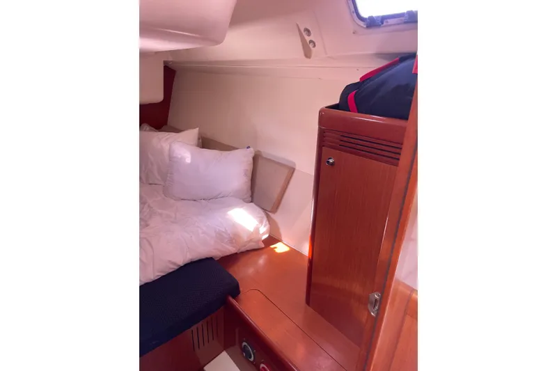 Slide: The Image of Cozy cabin interior of 2010 Beneteau Oceanis 37 sailboat with wooden cabinetry. - 60