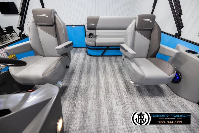 Slide: The Image of Interior of 2025 Bennington 23 SSBSE boat with modern seating and sleek design. - 14