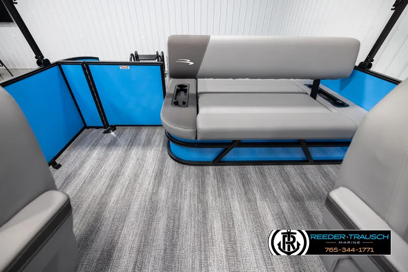 Slide: The Image of 2025 Bennington 23 SSBSE boat interior with gray seating and blue accents. - 15