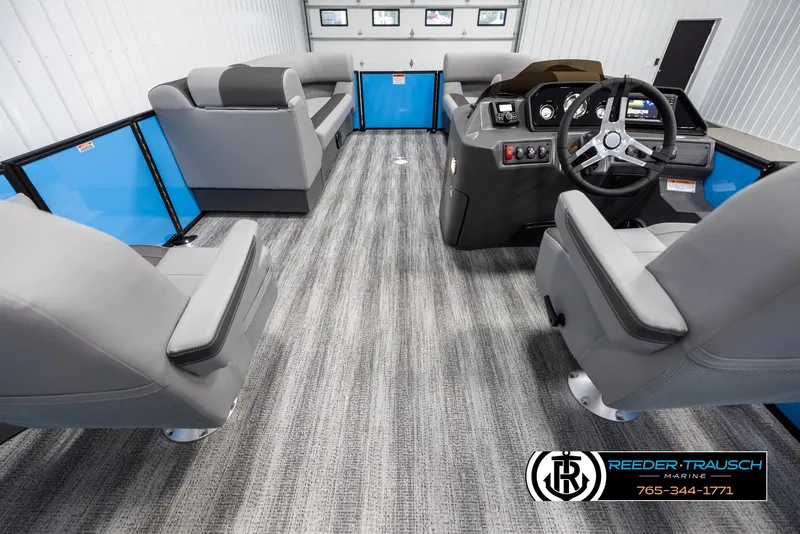 Slide: The Image of Interior of 2025 Bennington 23 SSBSE pontoon boat with modern seating and steering console. - 17