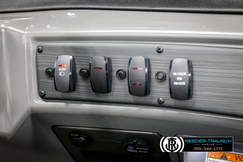 Slide: The Image of Control panel of 2025 Bennington 23 SSBSE boat with accent and RGB lighting switches. - 30