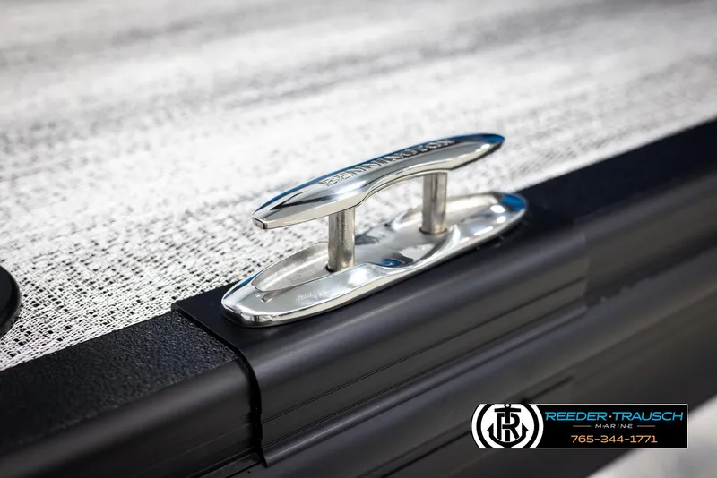 Slide: The Image of 2025 Bennington 23 SSBSE boat cleat detail with Reeder-Trausch Marine logo. - 46