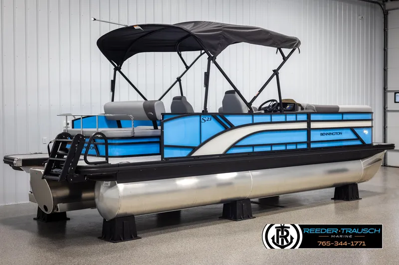 Slide: The Image of 2025 Bennington 23 SSBSE pontoon boat with canopy in showroom. - 6