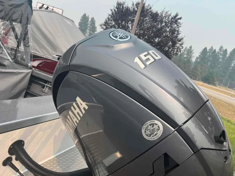 Slide: The Image of Yamaha 150 outboard motor on a 2024 Duckworth 18 ADV XT boat. - 12