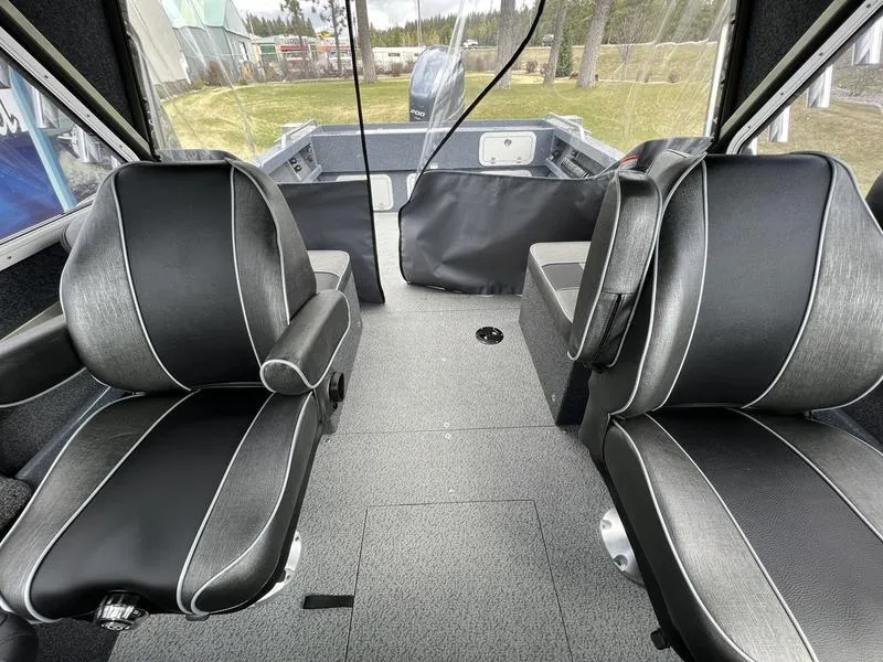 Slide: The Image of Interior of 2023 Duckworth 20 NAV SPT boat with black seating and spacious layout. - 18