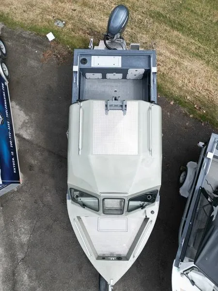 Slide: The Image of 2023 Duckworth 20 NAV SPT boat, aerial view, parked on pavement. - 21