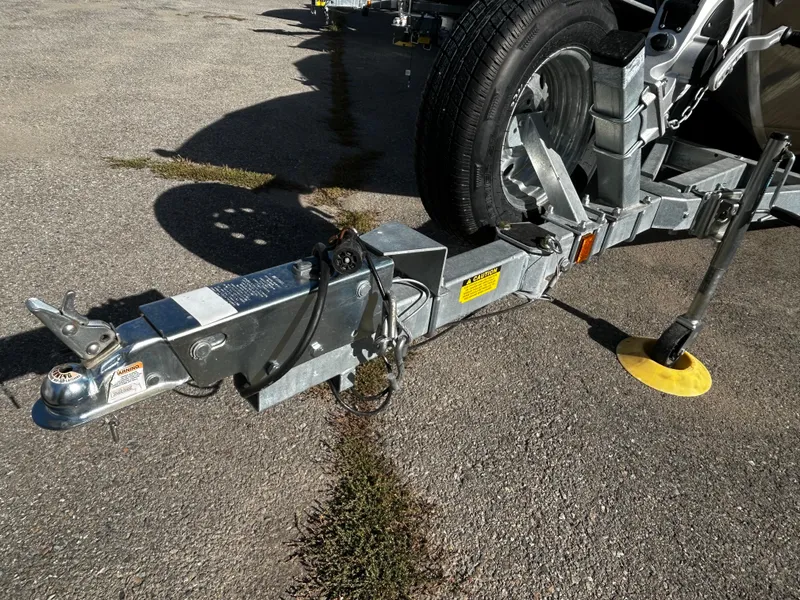 Slide: The Image of Trailer hitch of 2023 Duckworth 20 NAV SPT boat on pavement. - 24