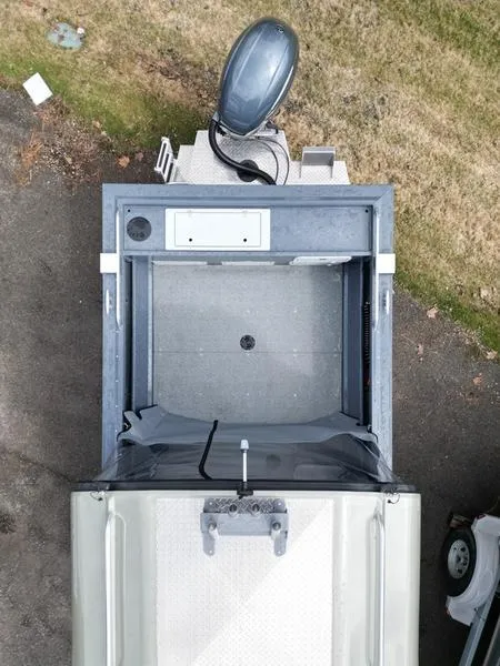 Slide: The Image of Overhead view of 2023 Duckworth 20 NAV SPT boat on pavement. - 6