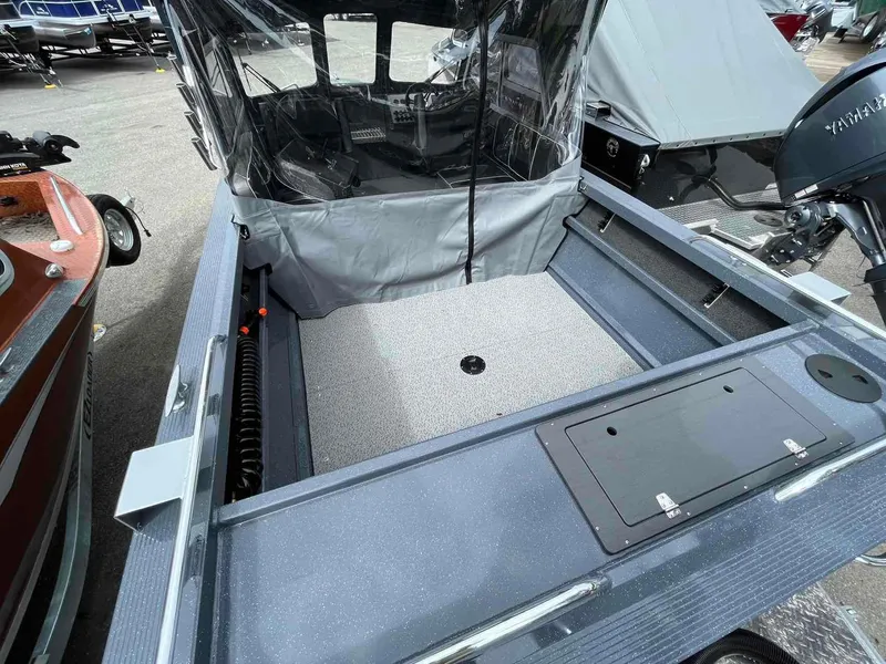 Slide: The Image of 2024 Duckworth 20 NAV SPT boat interior with spacious deck and covered cockpit. - 5