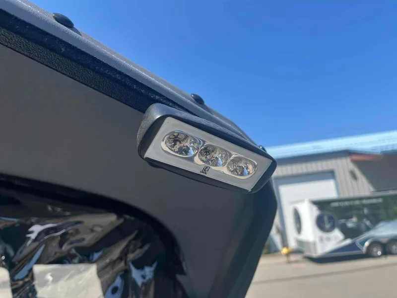 Slide: The Image of LED light on 2024 Duckworth 21 Discovery boat, clear sky background. - 12