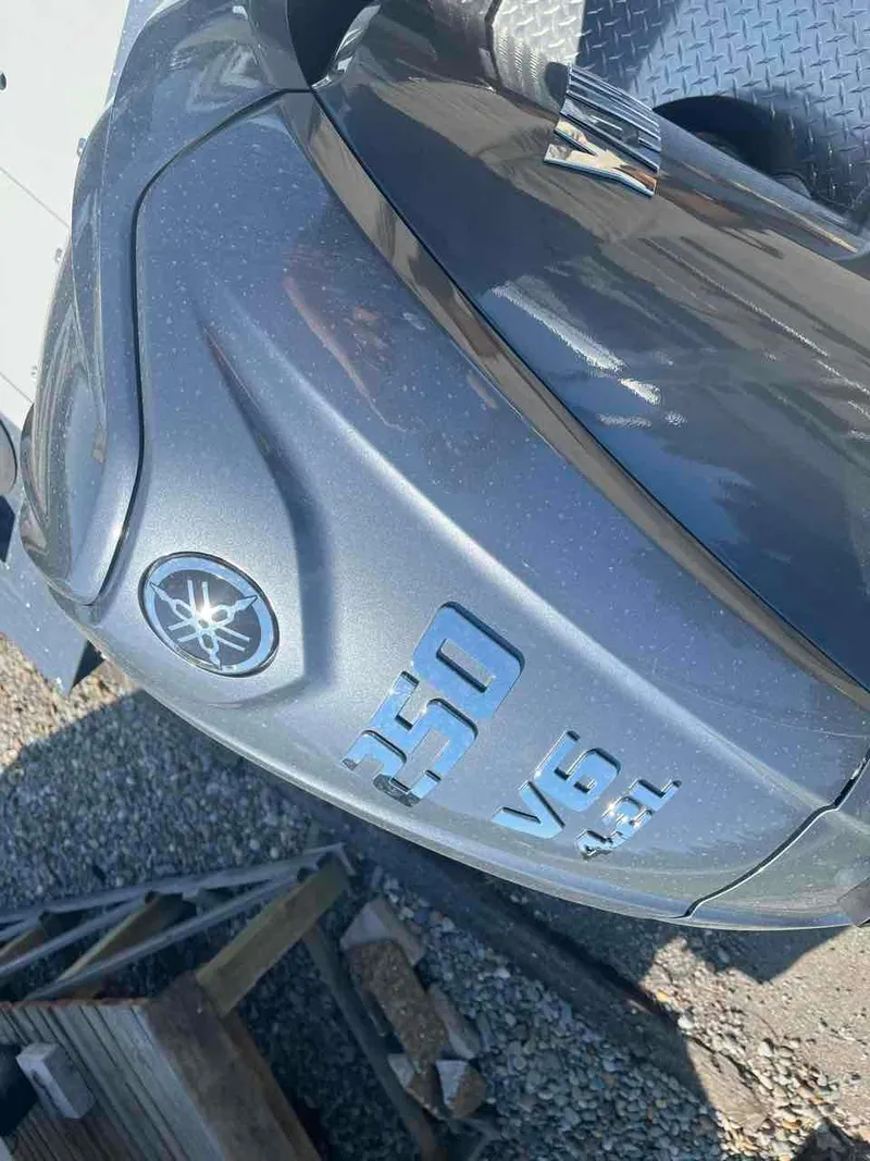 Slide: The Image of 2024 Duckworth 21 Discovery with Yamaha 250 V6 engine, close-up view. - 14