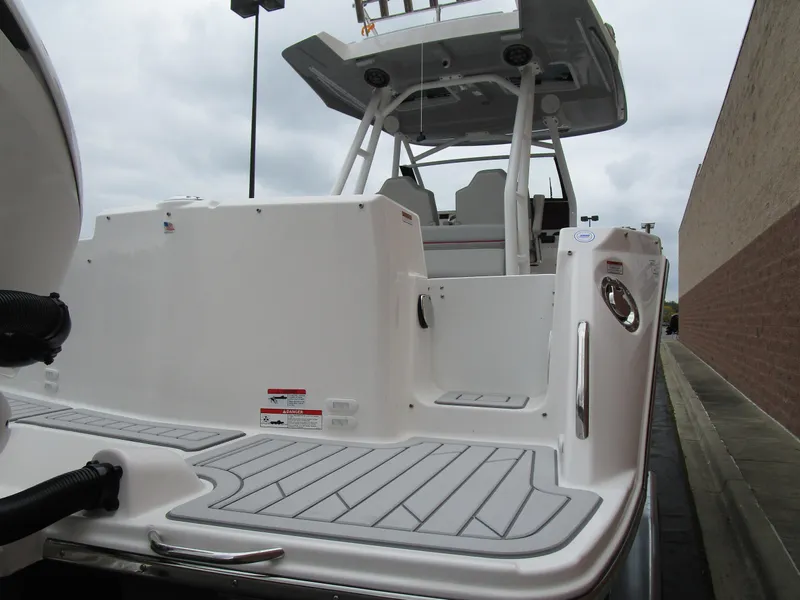 Slide: The Image of 2025 Solara S-250 CW boat, rear deck view, sleek design, modern features. - 10