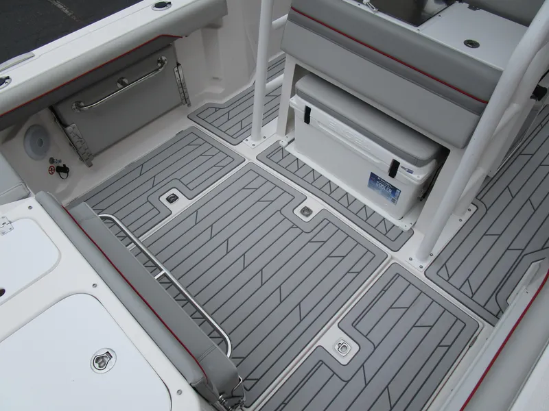 Slide: The Image of 2025 Solara S-250 CW boat interior with gray non-slip flooring and seating. - 14