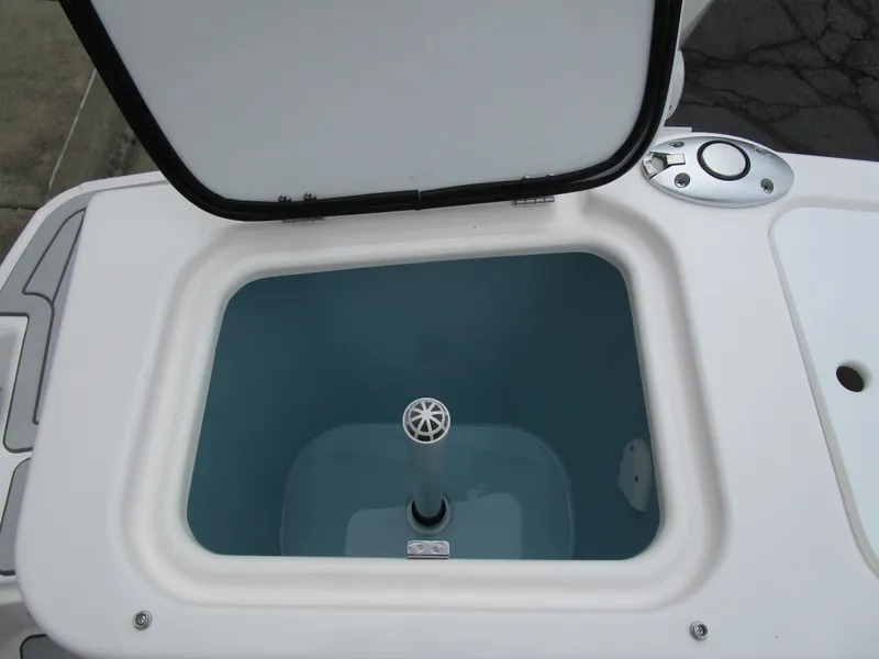 Slide: The Image of Open storage compartment on 2025 Solara S-250 CW boat. - 22