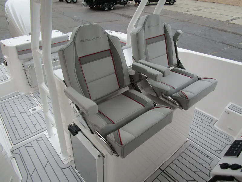 Slide: The Image of 2025 Solara S-250 CW boat seats, featuring sleek gray design with red accents. - 29