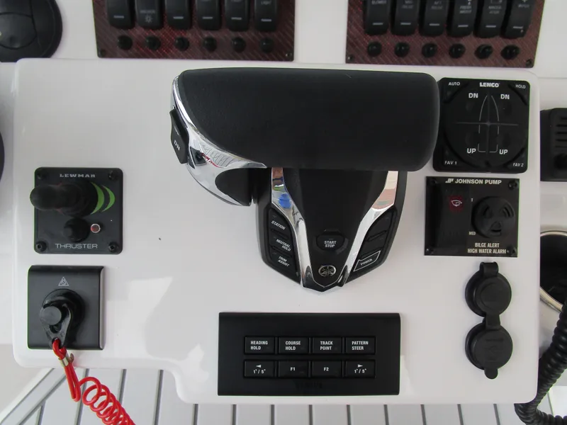 Slide: The Image of Control panel of 2025 Solara S-250 CW boat with throttle and switches. - 33