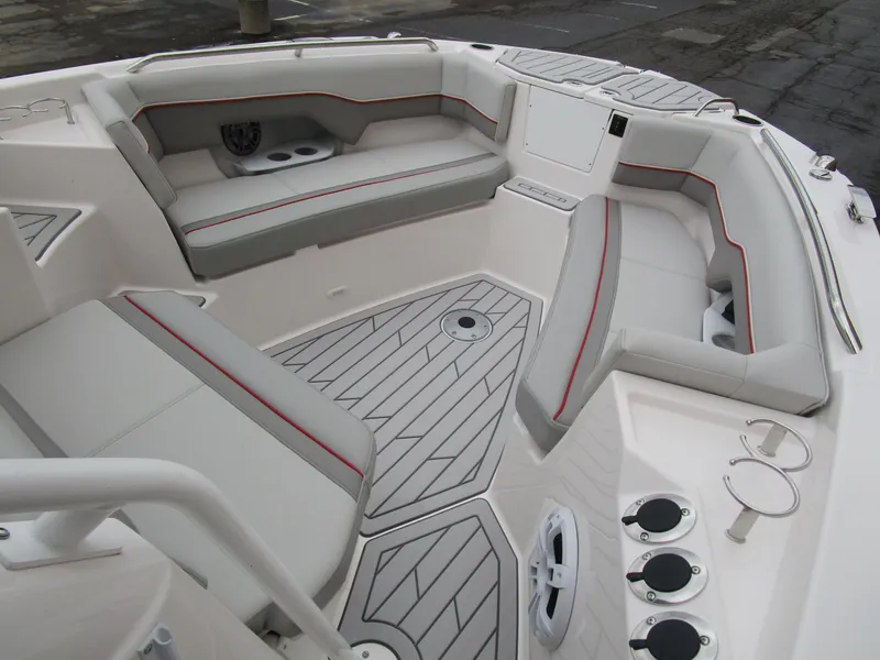 Slide: The Image of 2025 Solara S-250 CW boat interior with cushioned seating and modern design. - 40