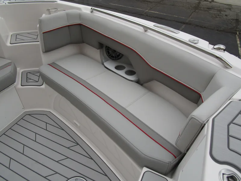 Slide: The Image of Luxurious seating on 2025 Solara S-250 CW boat with modern design and cup holders. - 43