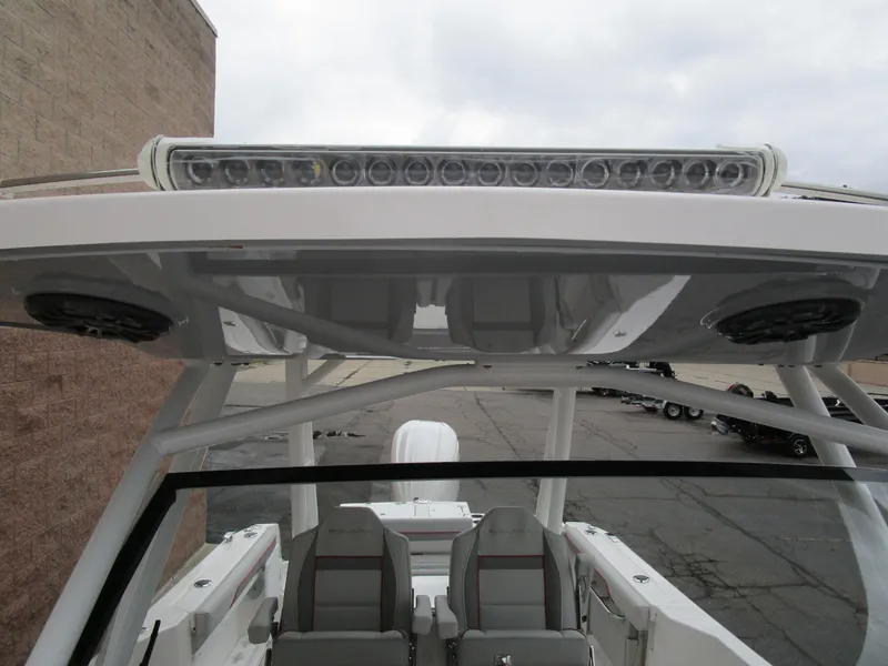 Slide: The Image of 2025 Solara S-250 CW boat with modern canopy and seating. - 48