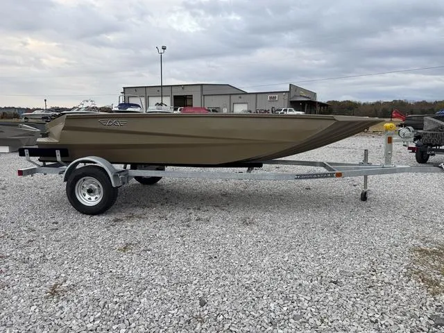 Slide: The Image of 2025 Edge Duck Boats SPORTSMAN 553 DB BO on trailer, gravel lot, overcast sky. - 4