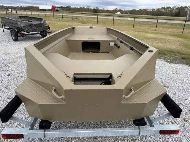 Slide: The Image of 2025 Edge Duck Boats SPORTSMAN 553 DB BO on trailer, beige color, outdoor setting. - 6