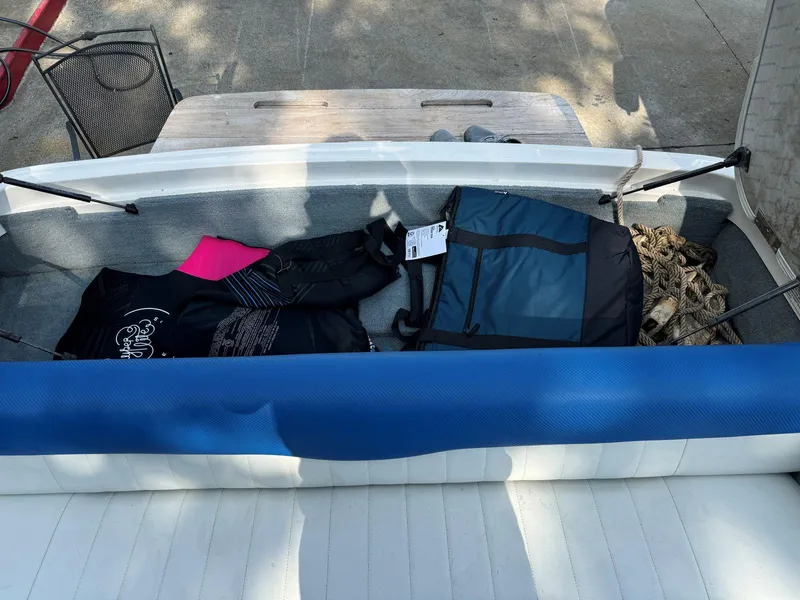 Slide: The Image of 2003 MasterCraft ProStar 197 boat interior with gear and storage area. - 15