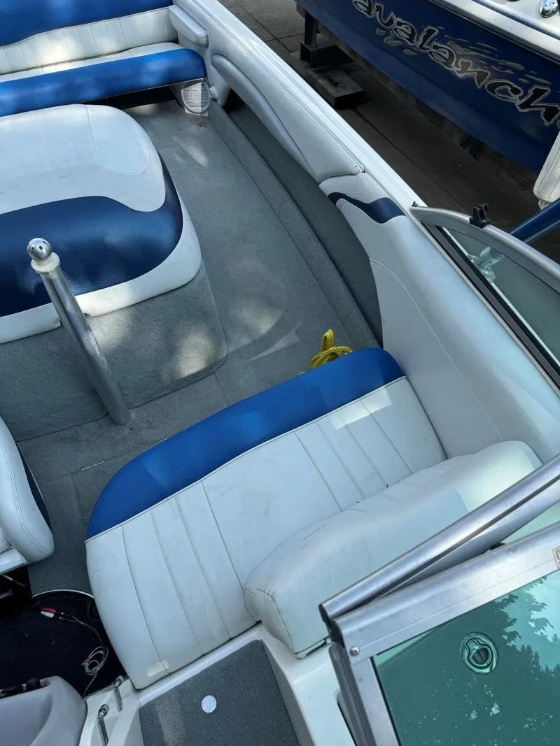 Slide: The Image of 2003 MasterCraft ProStar 197 interior with blue and white seating. - 8