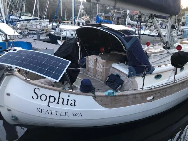 Slide: The Image of 1979 Hans Christian 38 MKII sailboat "Sophia" docked in Seattle with solar panels. - 7