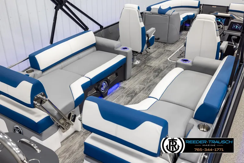 Slide: The Image of 2025 Avalon Catalina QLS boat interior with modern seating and sleek design. - 12