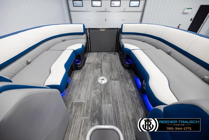 Slide: The Image of 2025 Avalon Catalina QLS boat interior with modern seating and blue LED lighting. - 18